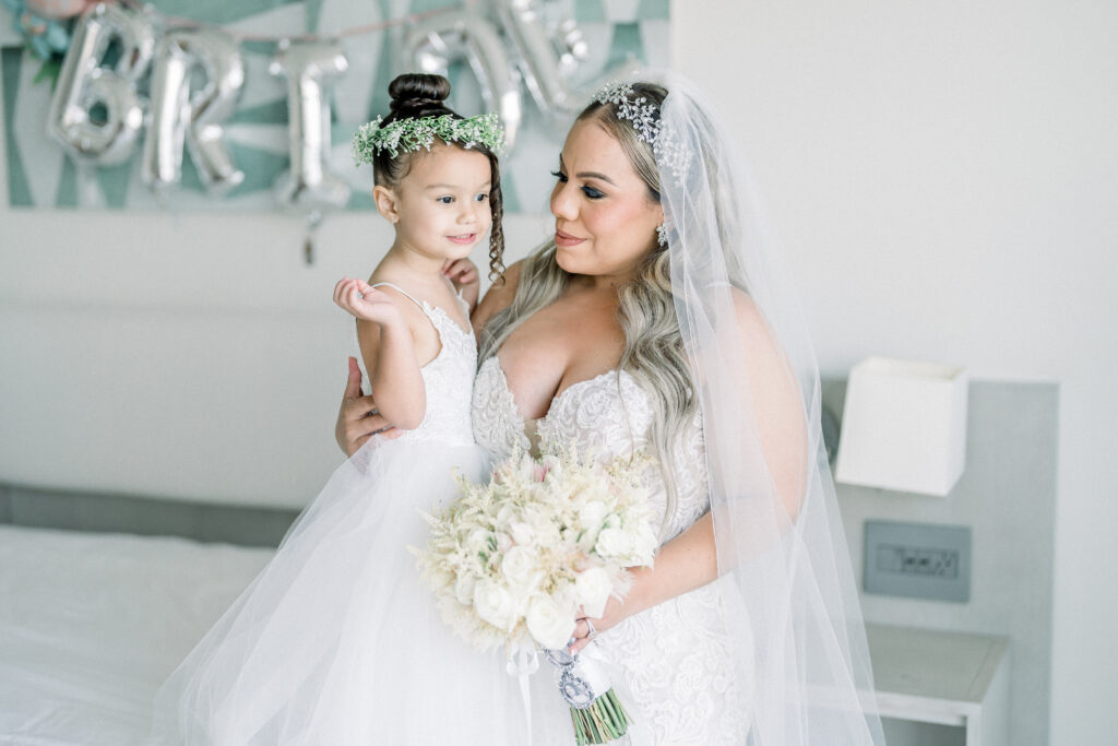 bride and daughter getting ready