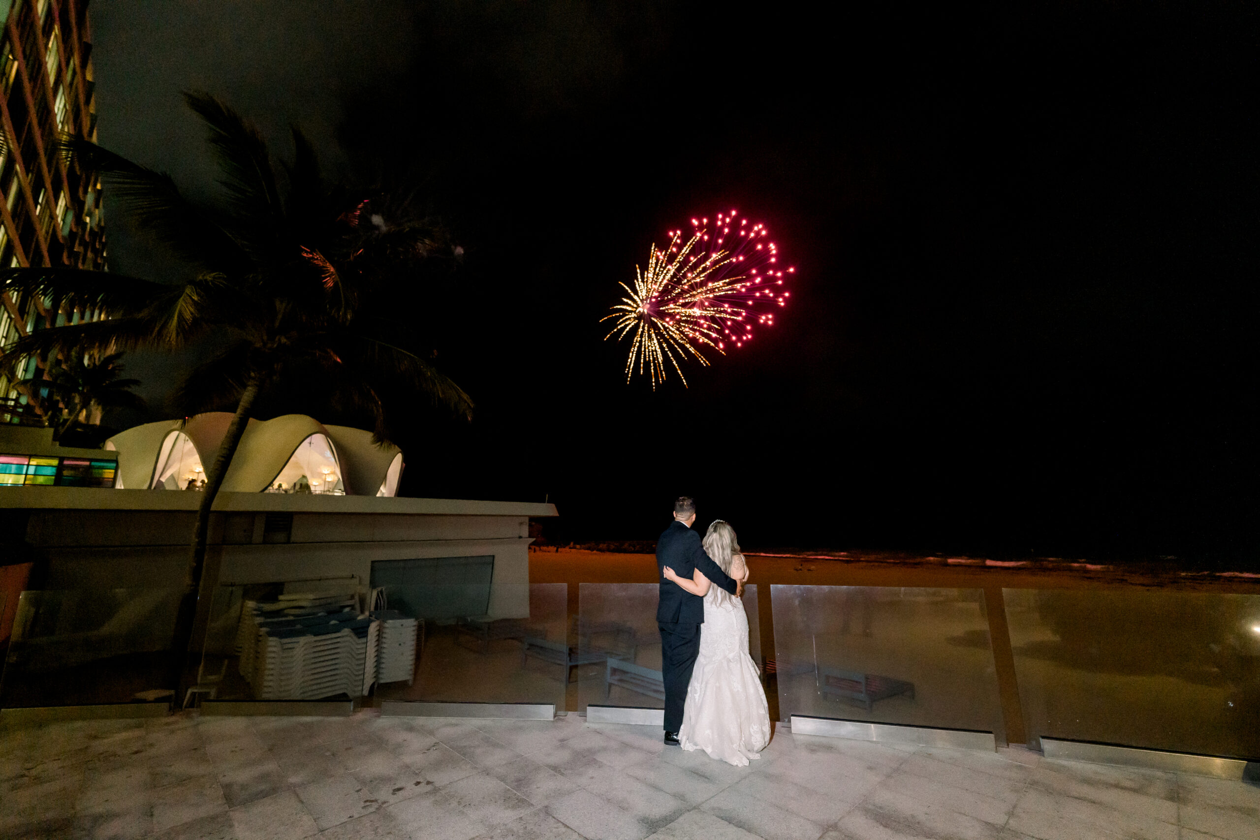 wedding couple watching fireworks oceanfront at la concha resort wedding