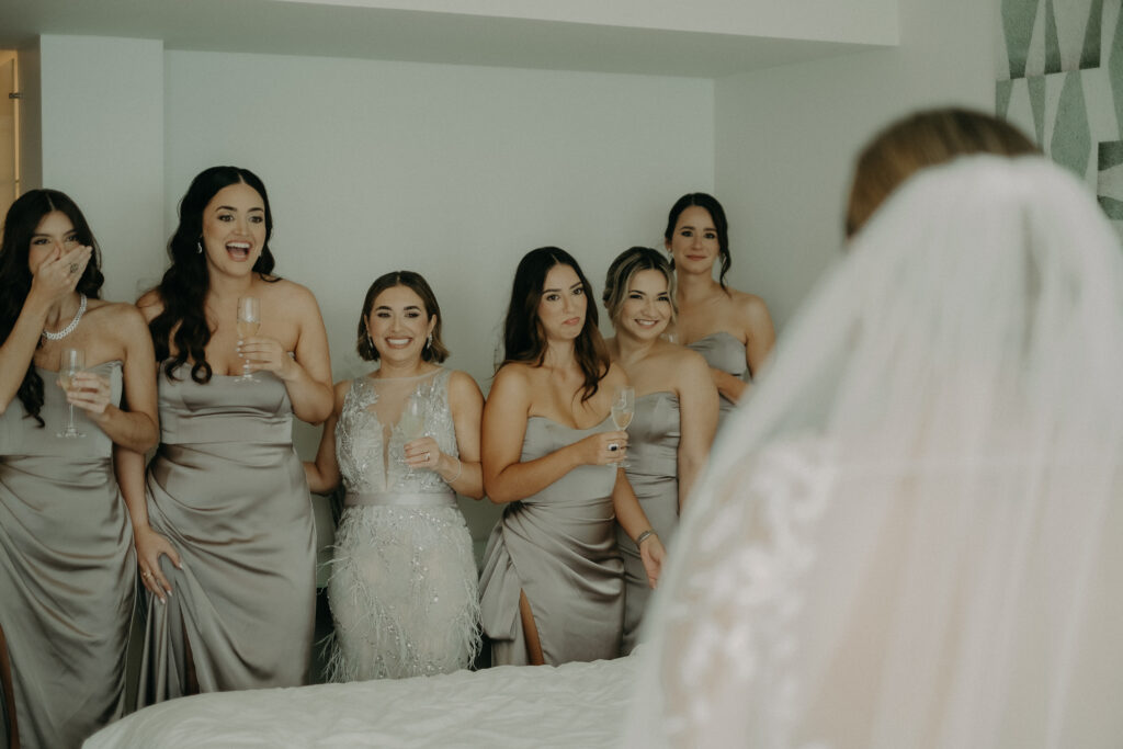 bride and wedding party at la concha resort wedding first look